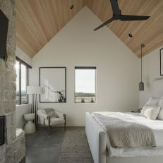 Neutral Modern Bedroom With Limestone Fireplace