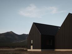 Black Modern Home With Pitched Roof