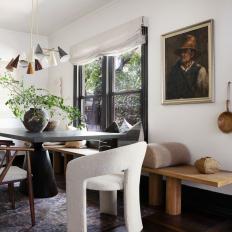 Eclectic Dining Room With Mismatched Chairs