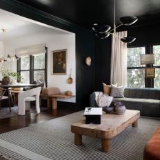 Eclectic Living Area With Black Ceiling