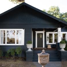 Craftsman Cottage With Dark Navy Exterior