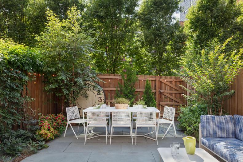 Backyard With White Dining Table