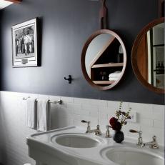 Round Mirrors Above Double-Bowl Sink in Neutral Contemporary Bathroom