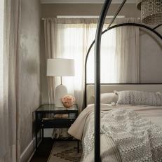 Neutral-Wallpapered Transitional Bedroom With Canopy Bed
