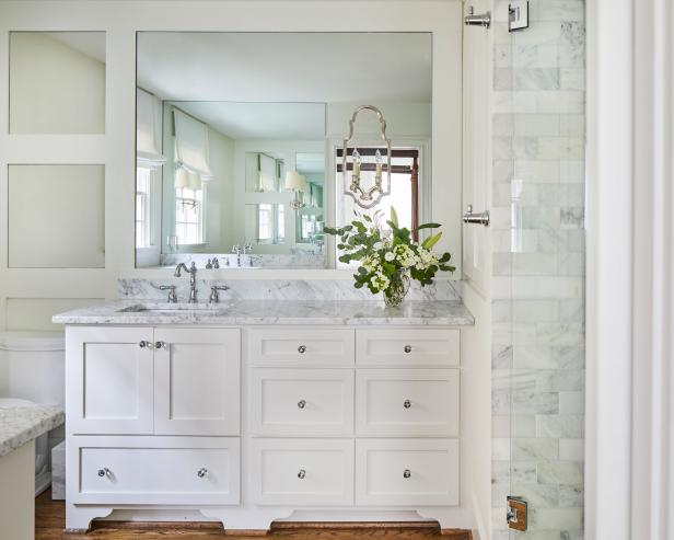 Marble-Topped White Vanity in Transitional Bathroom