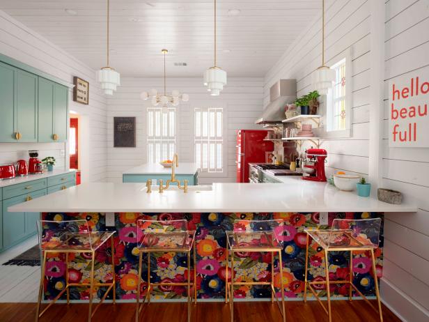 Multicolor Kitchen With Mint Cabinets and a Floral Wallpapered Island
