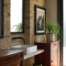 Neutral Transitional Bathroom With Exposed-Brick Wall