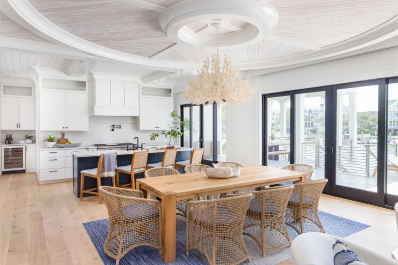 Large, Open Kitchen With Wooden Dining Table