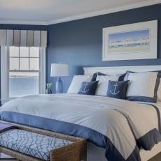 Blue and White Bedroom with Natural Light and Ocean Views