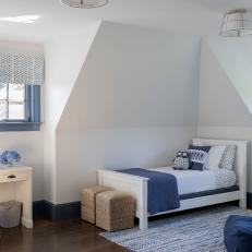 Child's bedroom with Blue Window Trim and White Furniture 