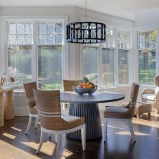 Breakfast Nook with Wicker Chairs and Pedestal Table