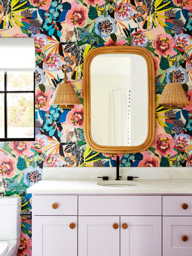 Multicolor Bathroom With Flowery Wallpaper and a Purple Vanity