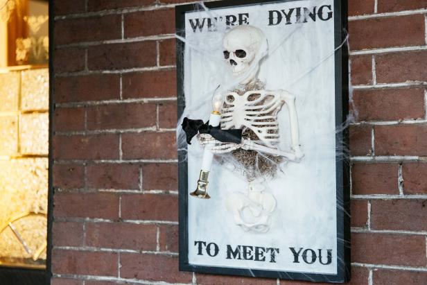 Skeleton Welcome Sign for Halloween that says "Dying" to Meet You