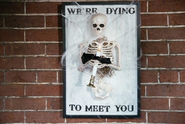 Skeleton Welcome Sign for Halloween that says "Dying" to Meet You