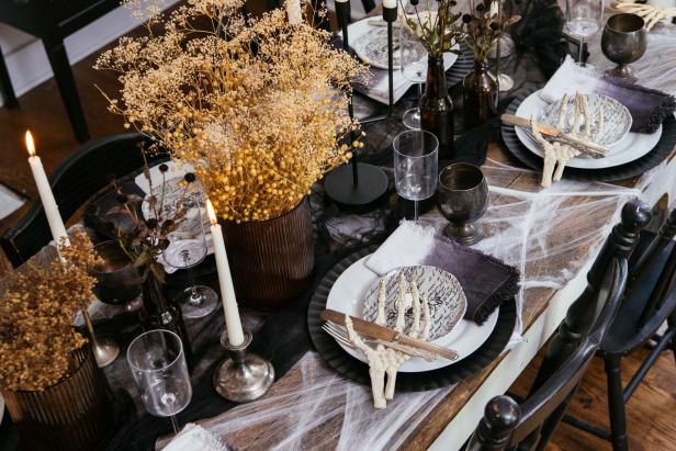 Overhead shot of place settings on a Halloween table.