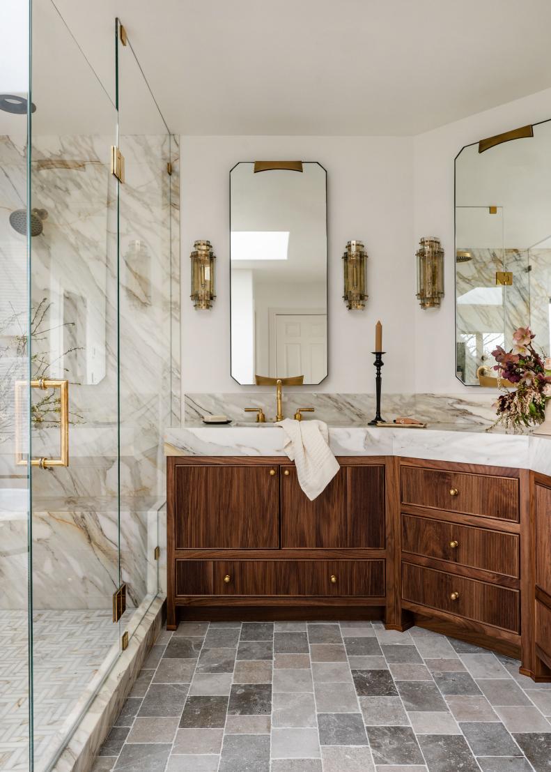 Spa Bathroom With Gold Sconces