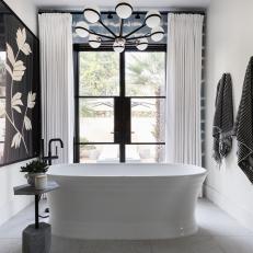 Black and White Spa Bathroom With Black Towels