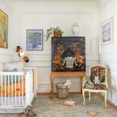 Traditional Nursery With Antique Cabinet