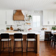 White Eat In Kitchen With Black Dining Chairs