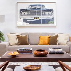 Neutral Midcentury Modern Sitting Room With Car Art