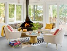 Eclectic Lakeside Living Room With a Modern Fireplace