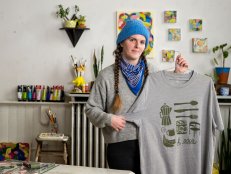 Woman Smiles to Camera Holding Block Print DIY Shirt
