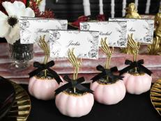 Elevate your Halloween dinner setting or buffet table with these glamourous yet easy-to-make place cards or food label holders. Our free, editable cards with a floral motif make the project easy and elegant.