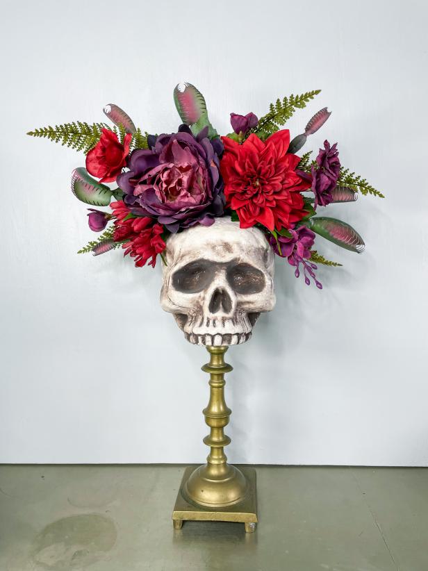 A photo of a skull and venus flytrap flower crown by La Casa De Flores
