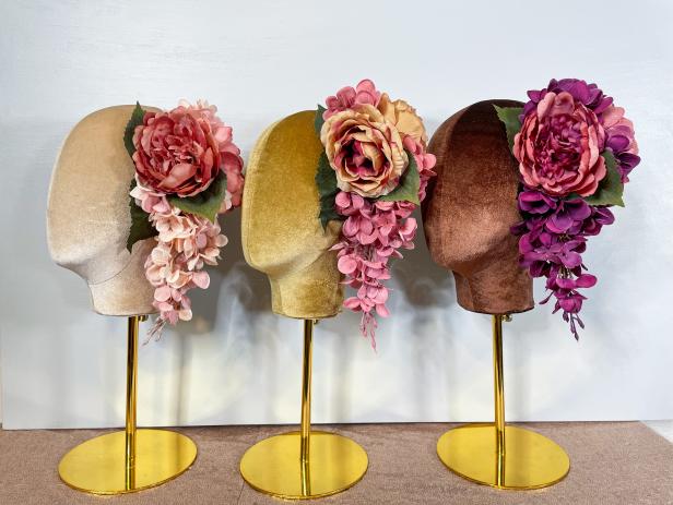 A photo of three pink flower crowns by La Casa De Flores.