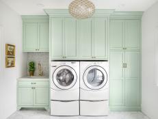 Pale Green Laundry  Space With a Sink
