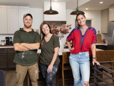 Kim Wolfe in the finished kitchen and dining room with her team of Amber and Trey Masciarelli, as seen on Battle on the Mountain, Season 1.