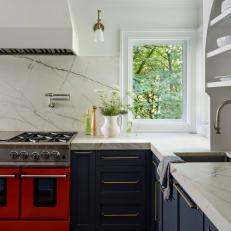 Contemporary Kitchen With Red Oven Range and Navy Cabinets