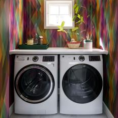 Colorful Laundry Room With Butcher Block Countertop Workspace