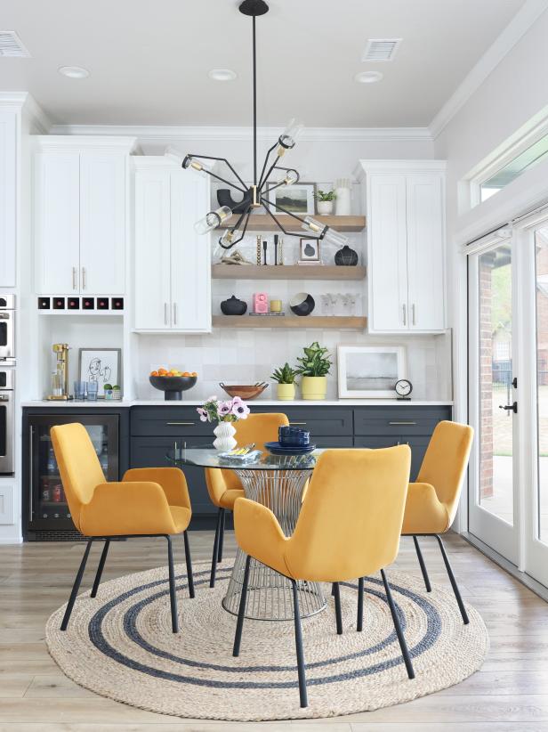 Black and White Kitchen With Modern, Yellow Dining Chairs