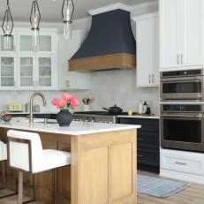 Transitional Black and White Kitchen With a Custom Range Hood