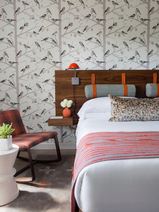 Neutral, Chic Hotel Suite With Wallpaper and a Floating Wood Headboard