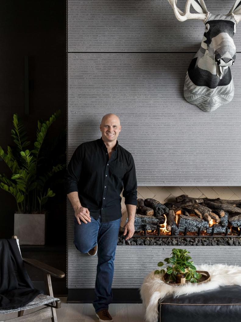 HGTV Designer Chip. Wade in Front of His Modern Fireplace