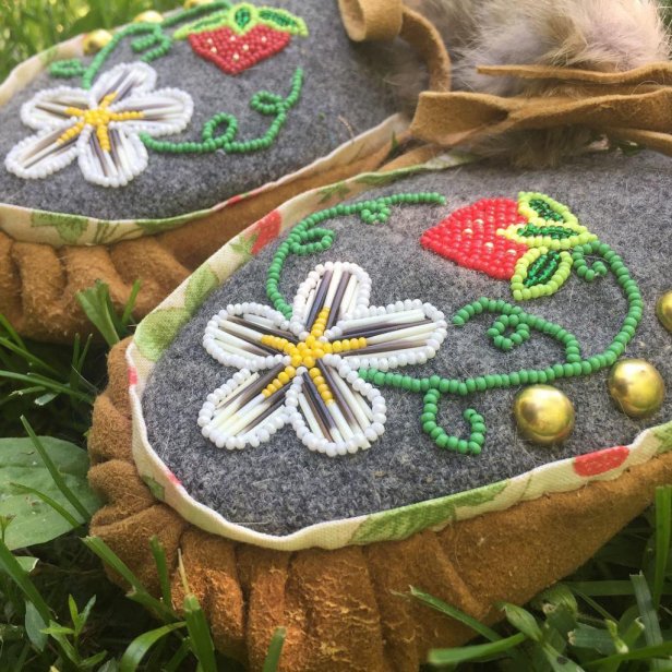 Close Up of Floral Beadwork on Moccasins