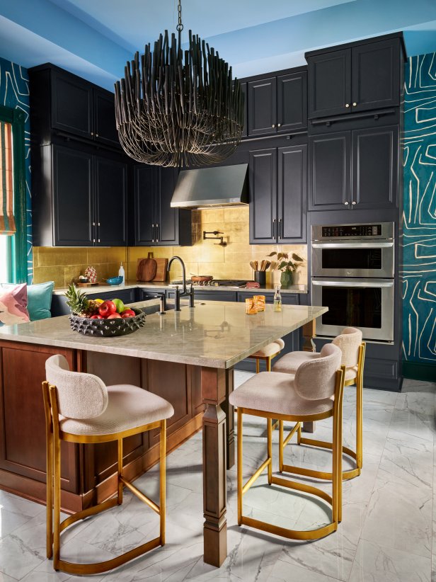 Blue Kitchen With a Metallic Gold Backsplash and Black Cabinets