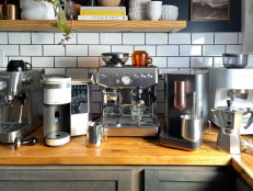 Several Espresso Machines on a Countertop