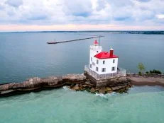 White and Red Lighthouse and Attached Dwelling in Ohio