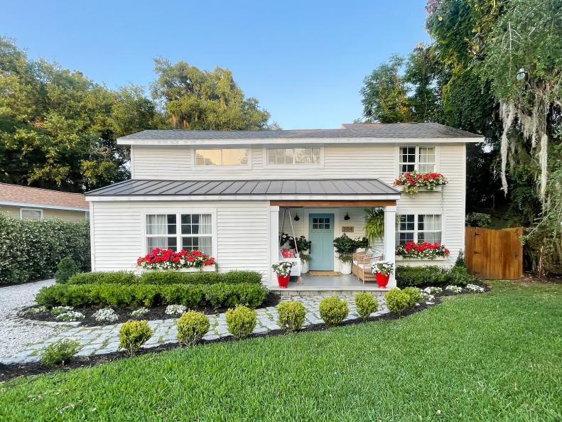 White Home With Red and Light Blue Accents