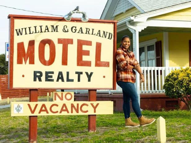 Mika Kleinschmidt in front of The William and Garland Motel, as seen on 100 Day Hotel Challenge, Season 1.