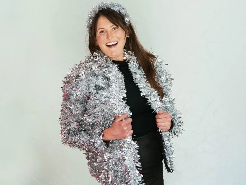 This tinsel coat is sure to make you the sparkliest guest at the party.
