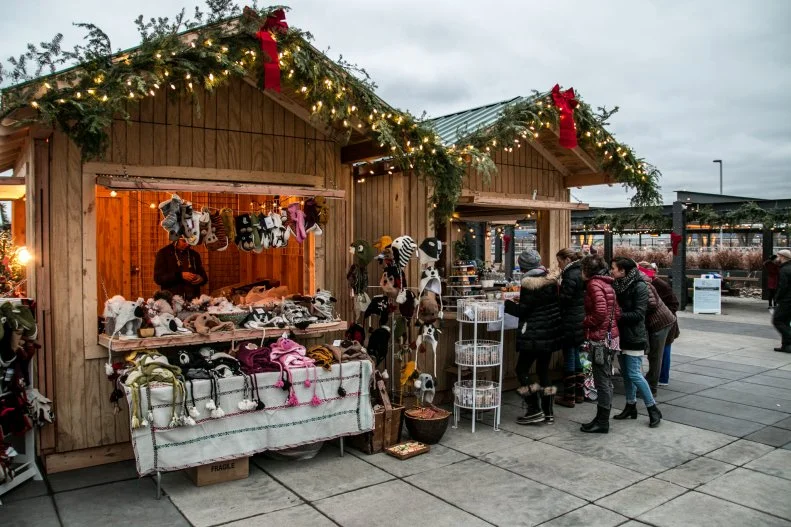 Outdoor Christmas markets are a longstanding tradition in Germany and Austria and in St. Paul, Minnesota visitors and residents can experience a Minnesota spin on those festive events featuring 60 vendors selling crafts, spiced mulled wine and European delicacies including roasted nuts, bratwurst, potato pancakes, strudel, Hungarian gulch, schnitzel, and aebleskivers (Danish pancake rounds), 