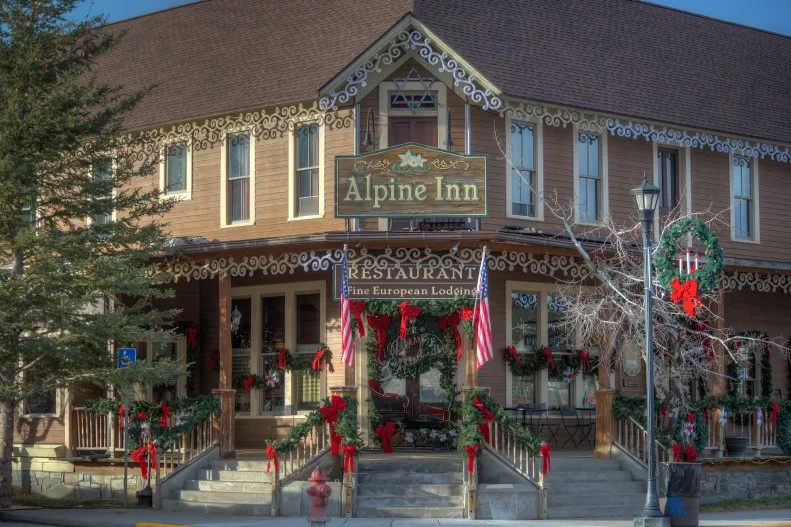 The historic 1884 Alpine Inn is a magical place to spend the holiday season. The family-owned hotel with only four rooms and its restaurant features German specialties like spaetzle, bratwurst and red cabbage.