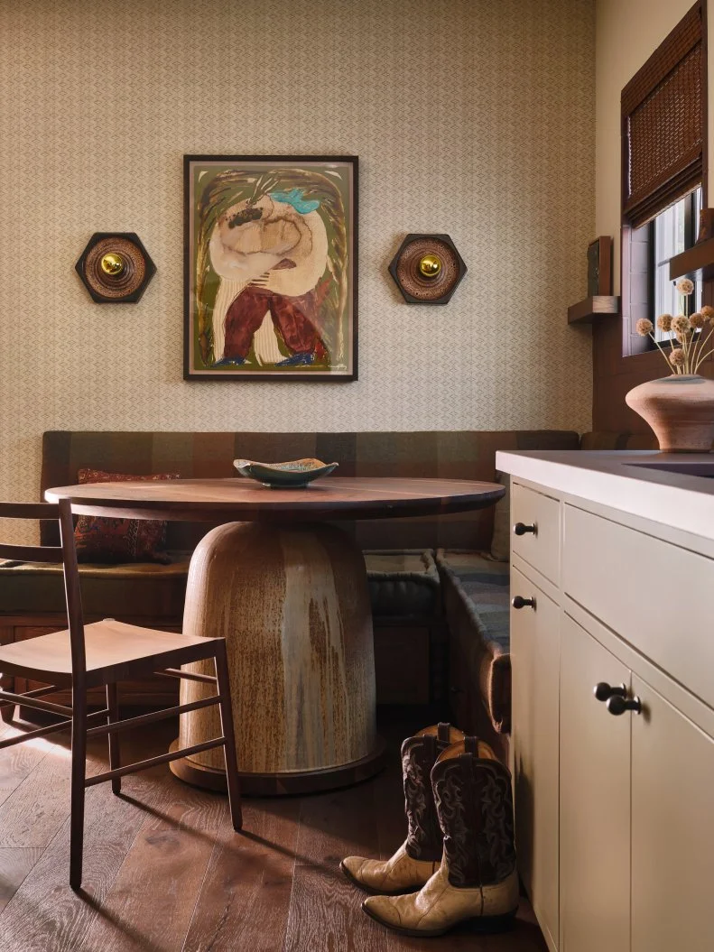Western-Inspired Dining Nook With Contemporary Furniture and Wallpaper