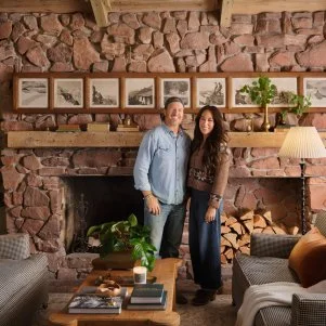 Hosts, Chip and Joanna Gaines portrait in the finished Colorado Mountain house.