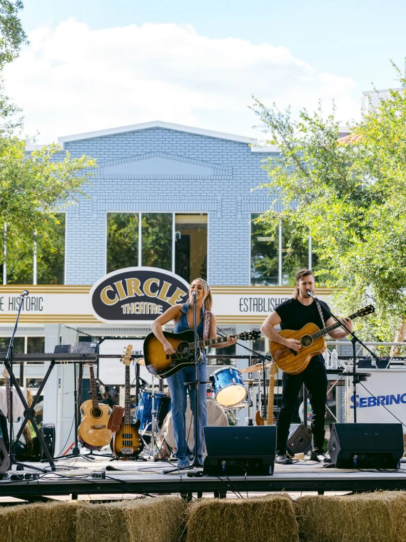 Ashley Cooke performing in Sebring's Circle Park, as seen on Home Town Takeover, Season 3
