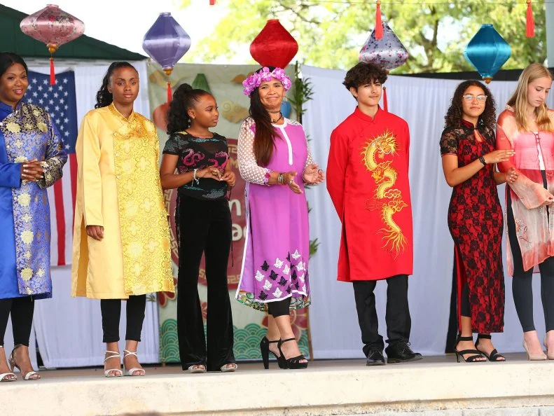 Costumed participants from the cultural villages at the New York State Fair.